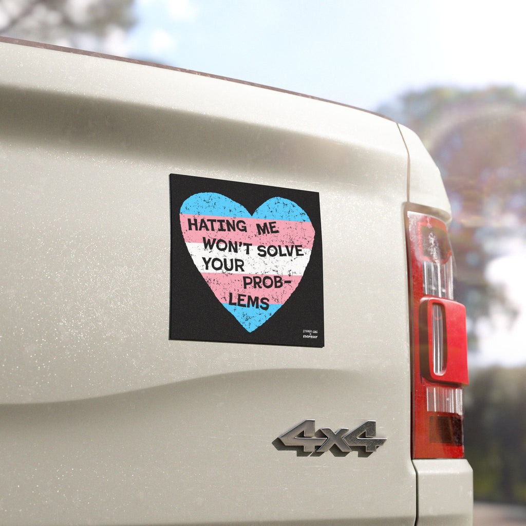 No Trans Hate Sticker & Magnet on white 4×4 pickup tailgate, featuring a striped heart with a trans pride message, showcasing durability and a commitment to equality and LGBTQ+ support.