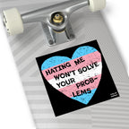 The No Trans Hate Sticker & Magnet features a distressed heart with the transgender pride flag and bold text: “HATING ME WON’T SOLVE YOUR PROB-LEMS,” emphasizing trans pride and resilience.