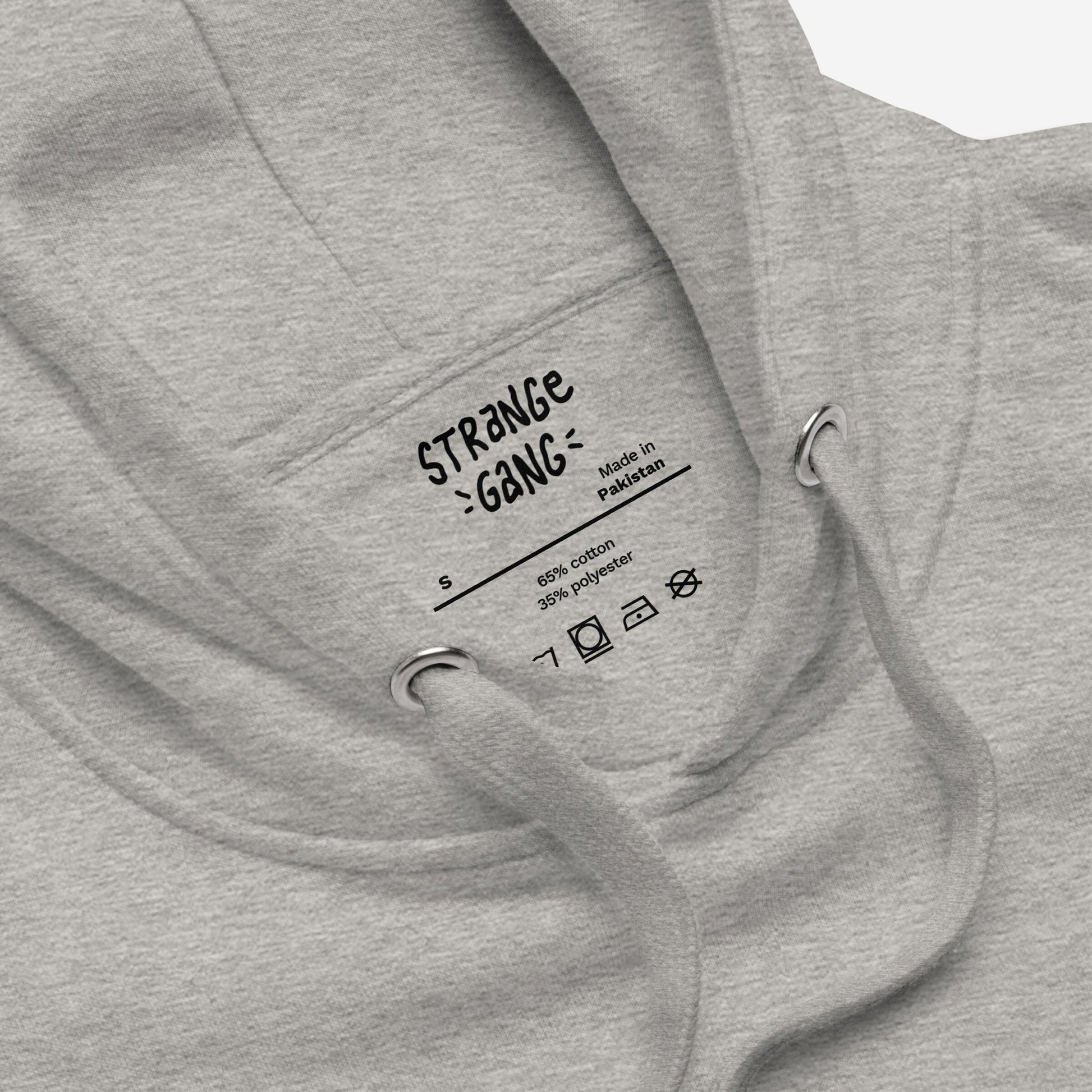 Chicago No Kings Flag Hoodie & Sweatshirt shows the inside neck with printed label, size S, fabric content, and care symbols. Metal grommets and drawstrings present, showcasing its anti-authoritarian message.
