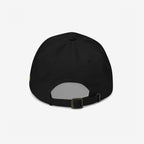 Back view of the Hop Nug Hat, featuring an adjustable fabric strap and metal buckle, designed for craft beer enthusiasts who appreciate a casual yet confident style.