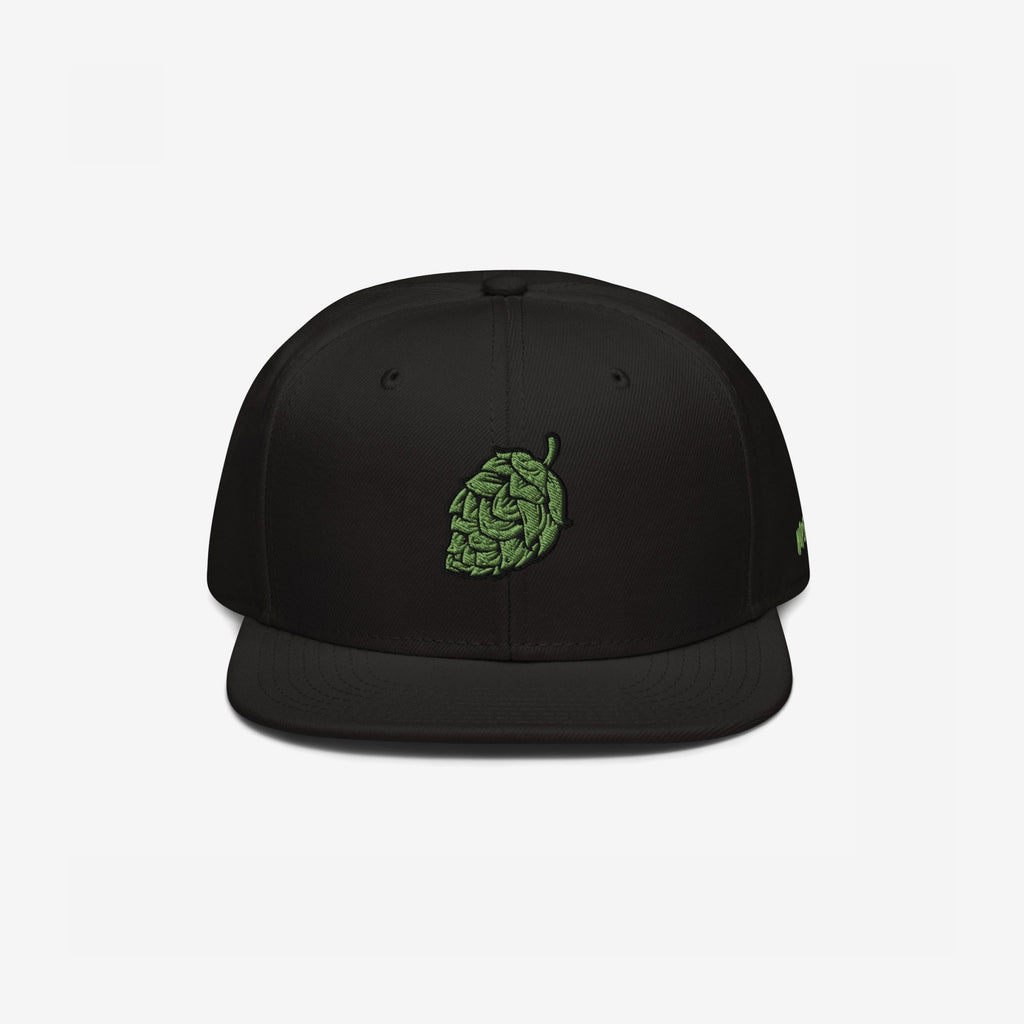 Hop Nug Hat features a black snapback cap with a green hop-cone design embroidered on the front, perfect for craft beer enthusiasts who appreciate bold style and subtle nods to their passion.