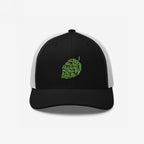 The Hop Nug Hat features a black front with a green embroidered hop cone, ideal for craft beer enthusiasts who appreciate casual, confident style in a classic trucker cap design.
