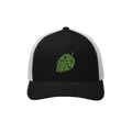 The Hop Nug Hat features a black front with a green embroidered hop cone, ideal for craft beer enthusiasts who appreciate cas