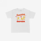Hopium Women's Baby Tee featuring a playful retro design with Surviving on Hopium in bold lettering and cartoon pill-shaped characters, capturing a whimsical, defiant attitude.