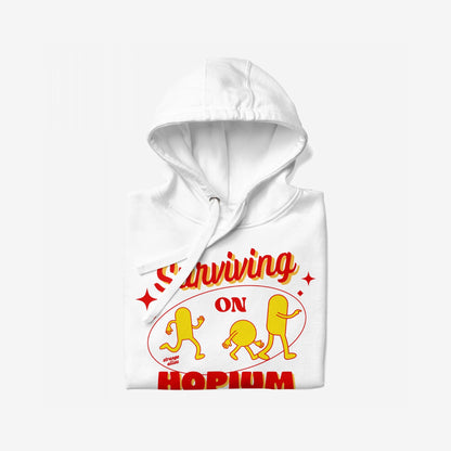 The Hopium Hoodie & Sweatshirt features a bold, retro-style print with “Surviving on Hopium” and cartoon figures, embodying a lifestyle of optimism and hope, ideal for daydreamers.