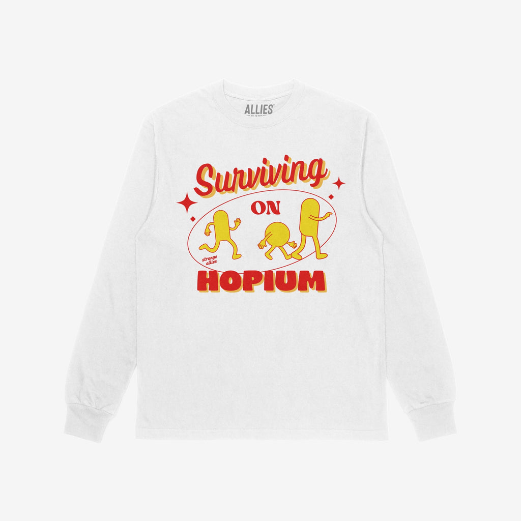Hopium Shirt featuring a retro graphic with Surviving on Hopium and cartoon capsule figures, embodying playful optimism. Designed by ALLIES, profits support mental health via NAMI.
