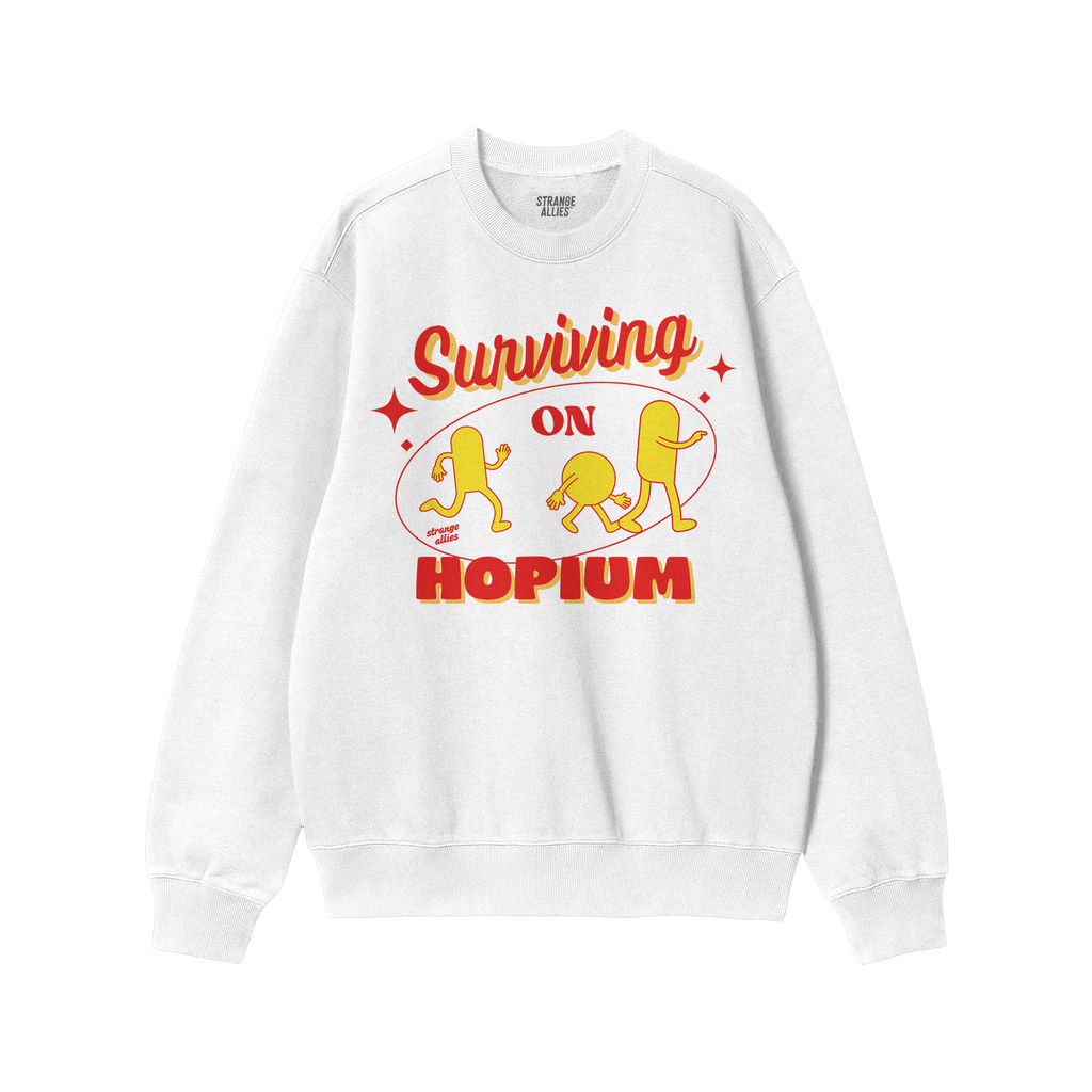 The Hopium Shirt features a white crewneck sweatshirt with Surviving on HOPIUM in bold red and yellow, plus three yellow cart