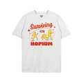 The Hopium Shirt features a retro-style graphic with Surviving on HOPIUM and three hop-shaped characters, embodying whimsical