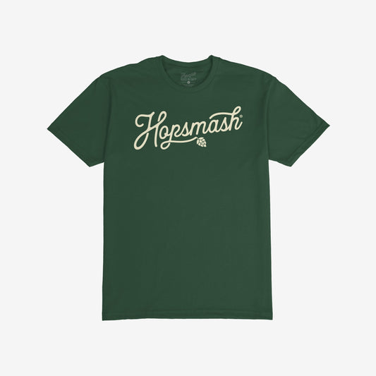 Forest-green Hopsmash T-shirt featuring a cream-colored, flowing script logo with a hop-cone graphic. Ideal for IPA enthusiasts, this tee embodies boldness and a passion for craft beer culture.