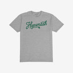 Hopsmash T-shirt features dark green script with a hop graphic, ideal for craft beer enthusiasts. This light-gray tee embodies a bold, rebellious spirit that aligns with inclusive values.