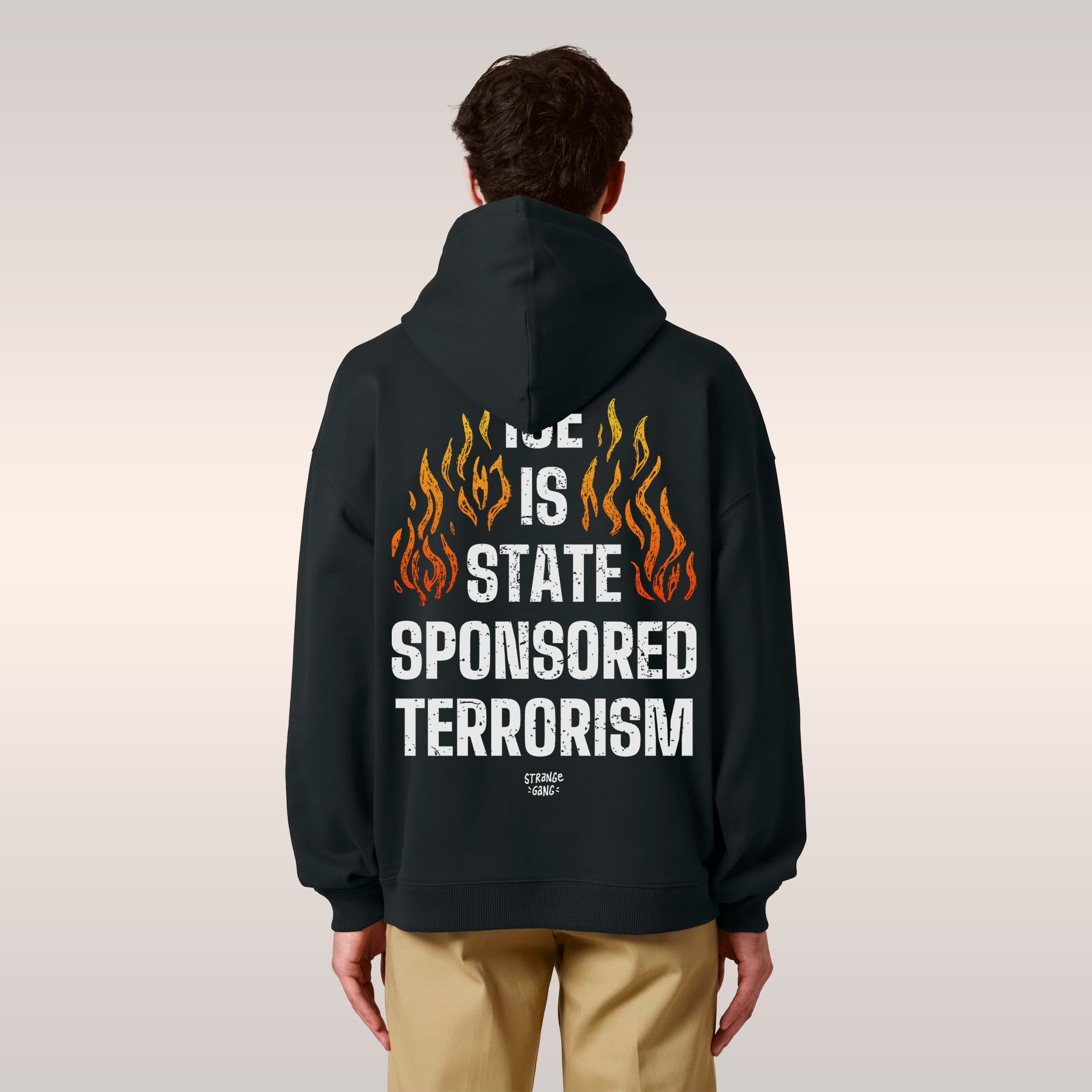 Two individuals in black hoodies; the left displays a small flame, while the right features ICE IS STATE SPONSORED TERRORISM