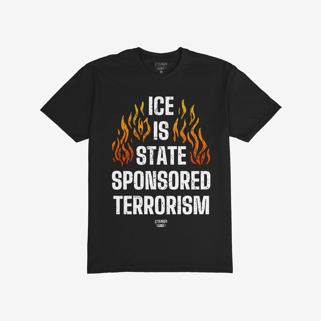 ICE Is State Sponsored Terrorism Shirt featuring bold, distressed-white text with orange-and-yellow flames, embodying protest spirit and activism against oppression. Ideal for those standing for immigrant rights.