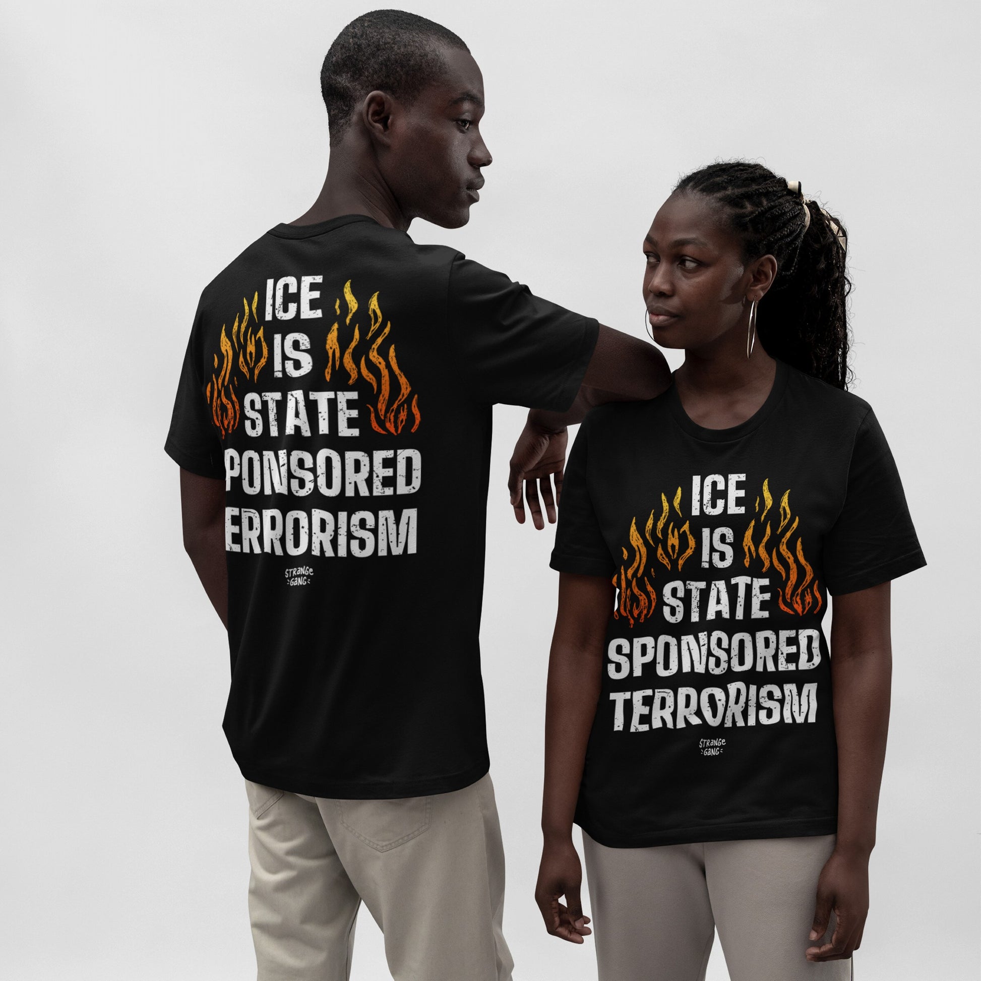 Models wear the ICE Is State Sponsored Terrorism T-shirt, featuring bold text and stylized flames, front and back. This statement piece demands attention and supports immigrant justice.