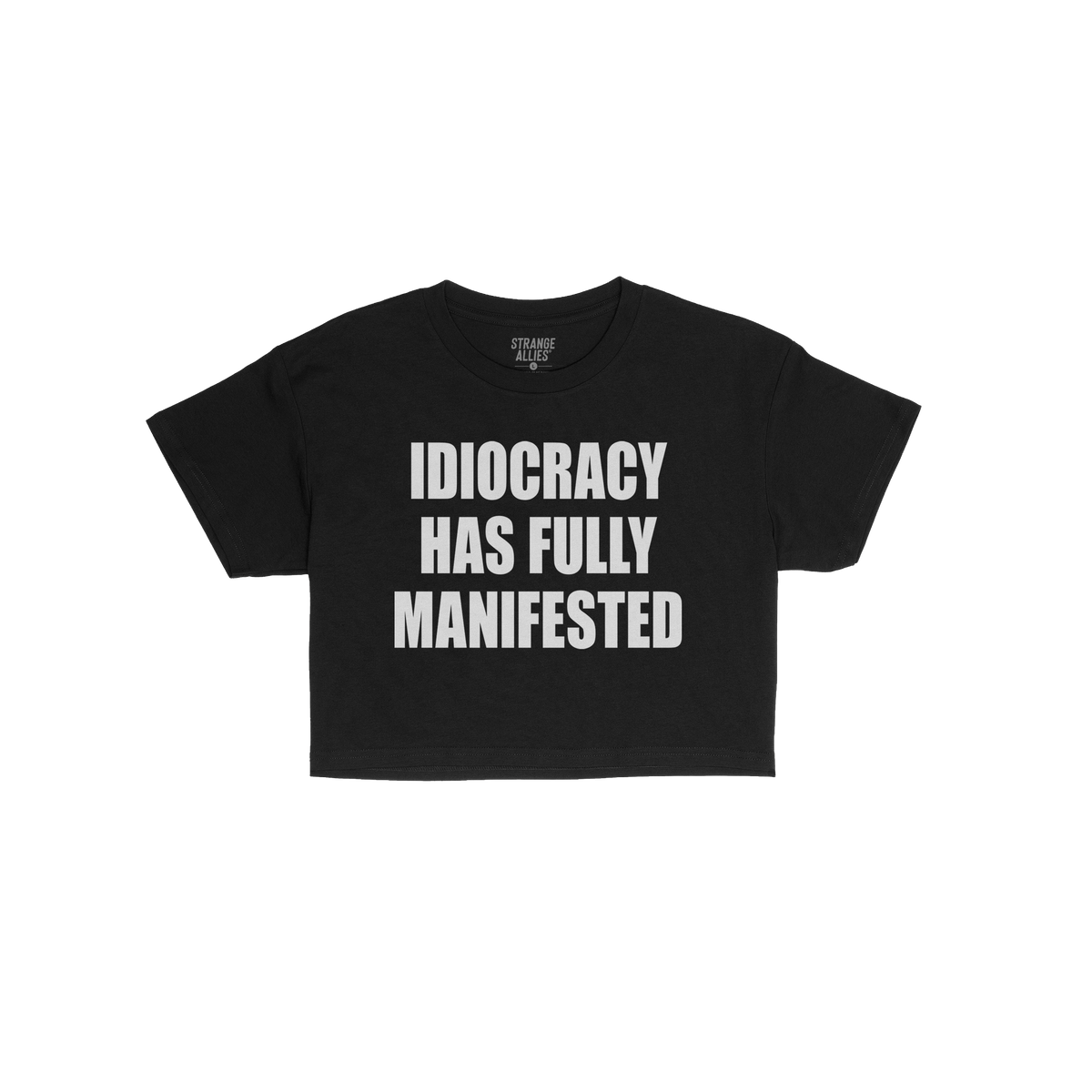 Idiocracy Women's Baby Tee features bold white text IDIOCRACY HAS FULLY MANIFESTED on a black T-shirt, highlighting societal 