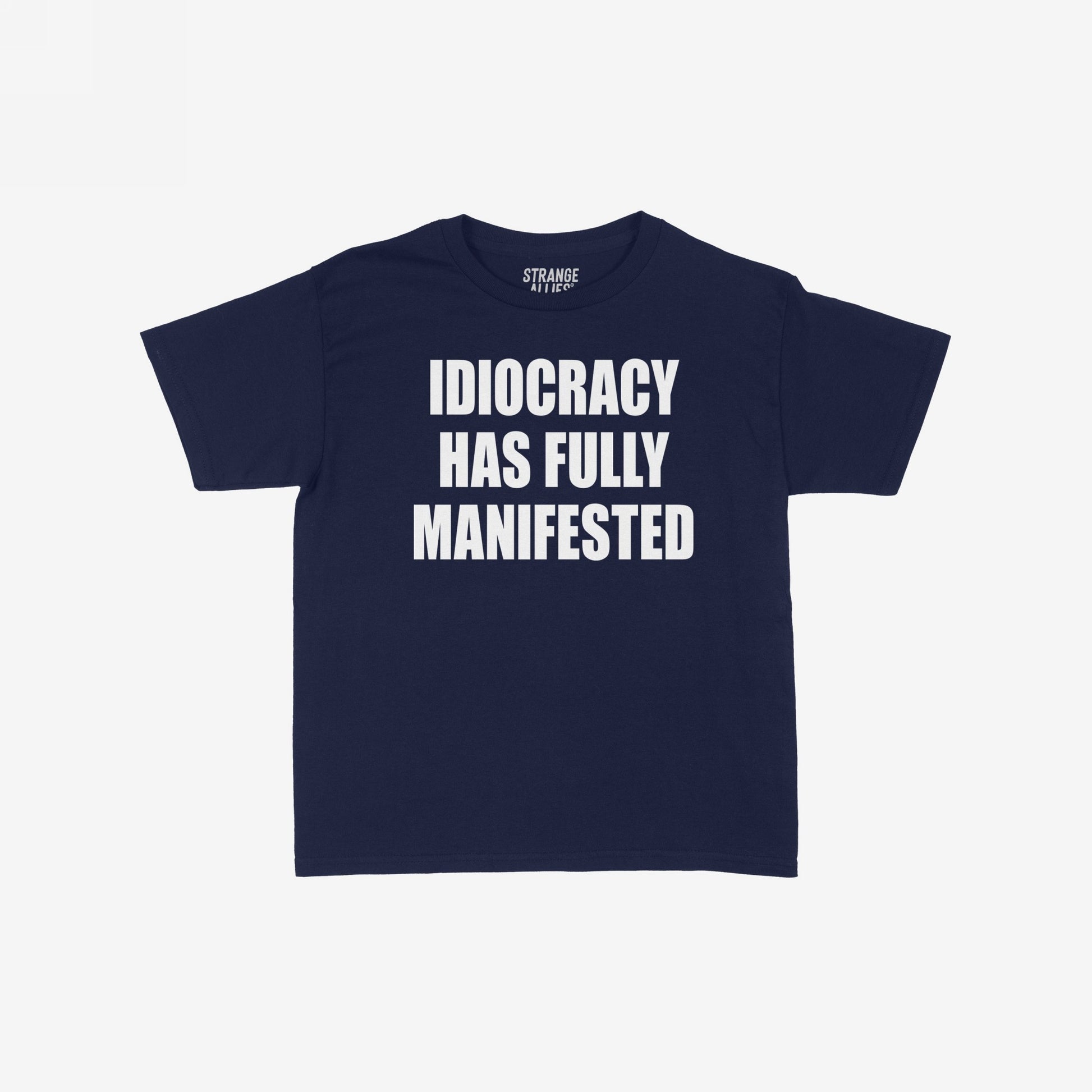 The Idiocracy Women's Baby Tee displays bold white text stating IDIOCRACY HAS FULLY MANIFESTED, capturing a satirical nod to societal commentary, ideal for expressive, thought-provoking casual wear.