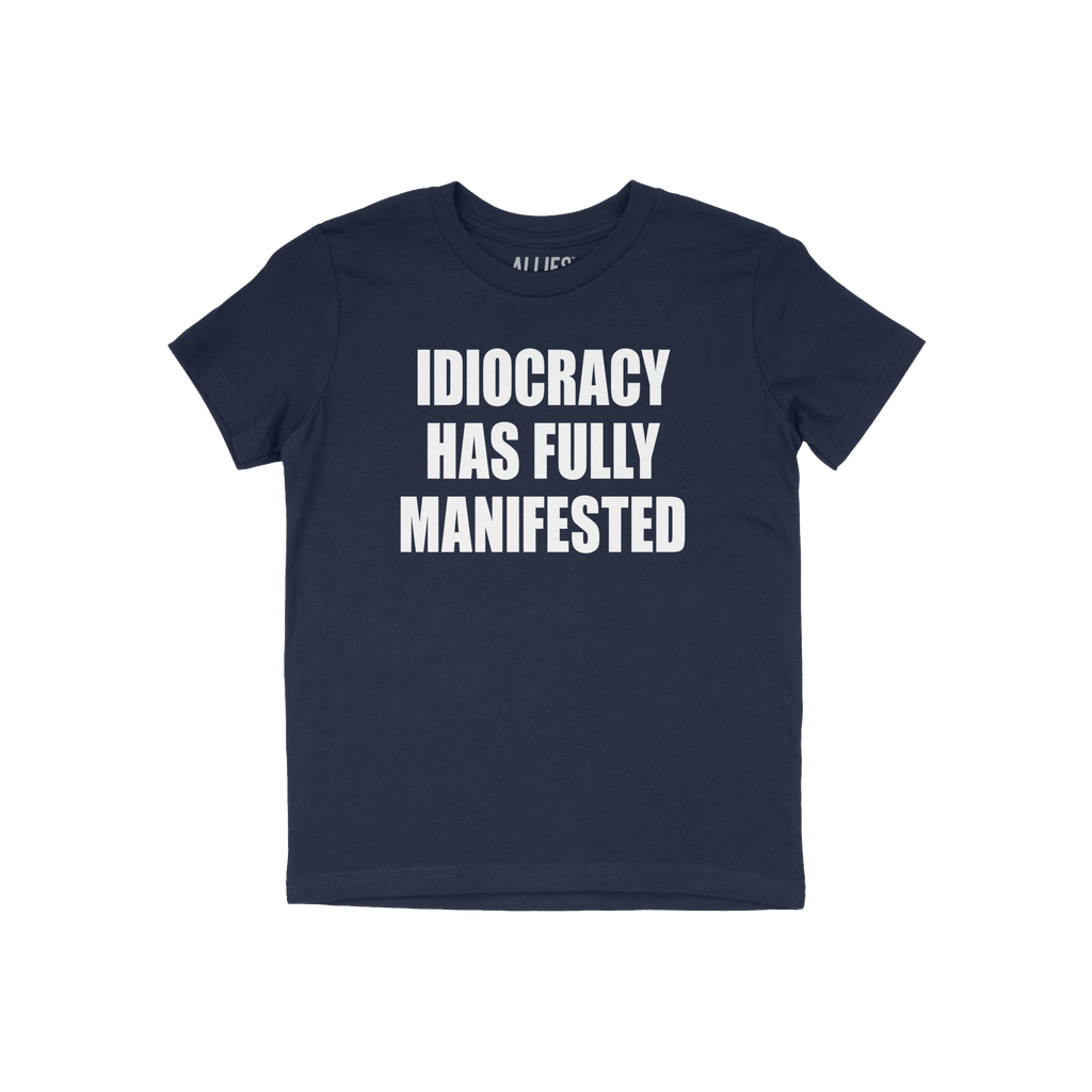 The Idiocracy T-shirt features a bold white slogan declaring “IDIOCRACY HAS FULLY MANIFESTED,” capturing the essence of m