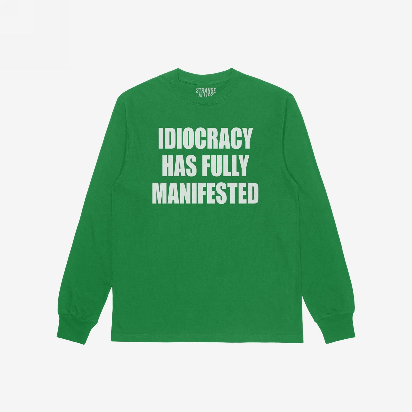 Green long-sleeve Idiocracy T-shirt features bold white lettering stating “IDIOCRACY HAS FULLY MANIFESTED. Ideal for those embracing political disillusionment with a touch of humor and truth.