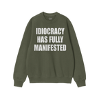 Idiocracy Sweatshirt featuring bold white text, IDIOCRACY HAS FULLY MANIFESTED, on a green crewneck. Label reads “ALLIES.��