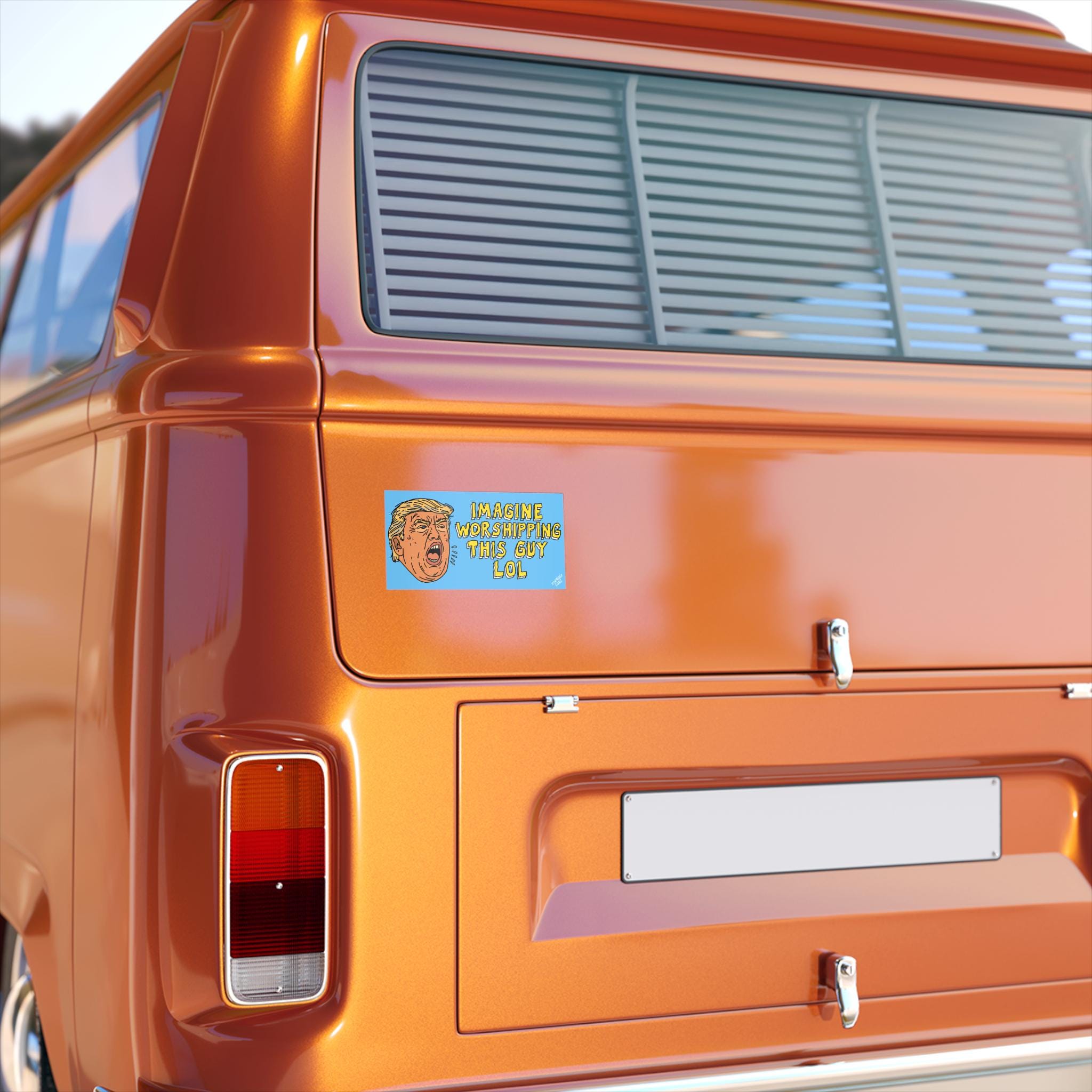 Rear view of a metallic-orange van displaying the Anti Trump LOL Magnet & Sticker, featuring a cartoonish male face and satirical text, ideal for progressive expressions against fascism and cult worship.