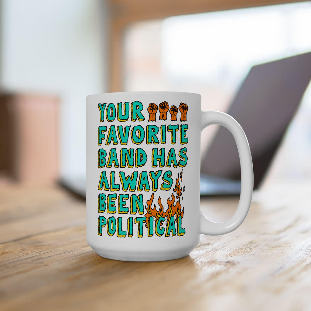 The Your Favorite Band Has Always Been Political Mug displays raised fists and flames, embodying punk rebellion through bold, hand-drawn text, perfect for those challenging societal norms with their morning brew.