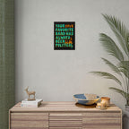 Your Favorite Band Has Always Been Political Poster on wall, featuring bold graphics and lettering. Below, a sideboard with books, a deer figurine, decorative bowl, candles, and a potted plant creates a modern eclectic vibe.