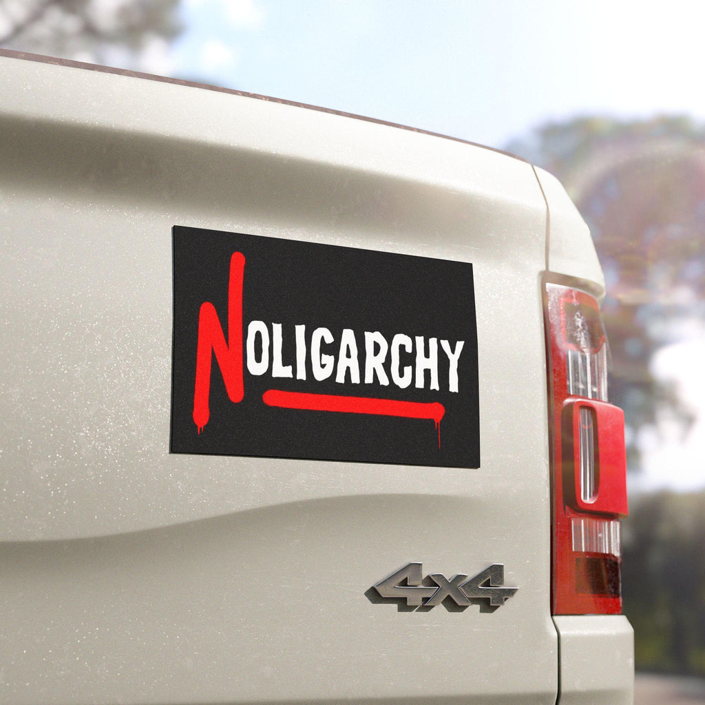 The No Oligarchy Sticker & Magnet adorns a white 4x4's tailgate, showcasing a bold, anti-authoritarian message against corporate greed with durable, weatherproof vinyl for cars, laptops, or protest gear.