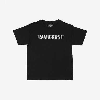 The Immigrant T-shirt features a black crewneck with IMMIGRANT in distressed white, crossed by scratch lines, symbolizing resilience and solidarity with immigrant communities, ideal for activism and daily wear.