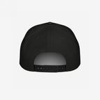 Back view of the Immigrant Hat, a black six-panel snapback with RICHARDSON on the adjustable strap. Features small ventilation eyelets and embodies rebellion with its bold stenciled barbed wire design.