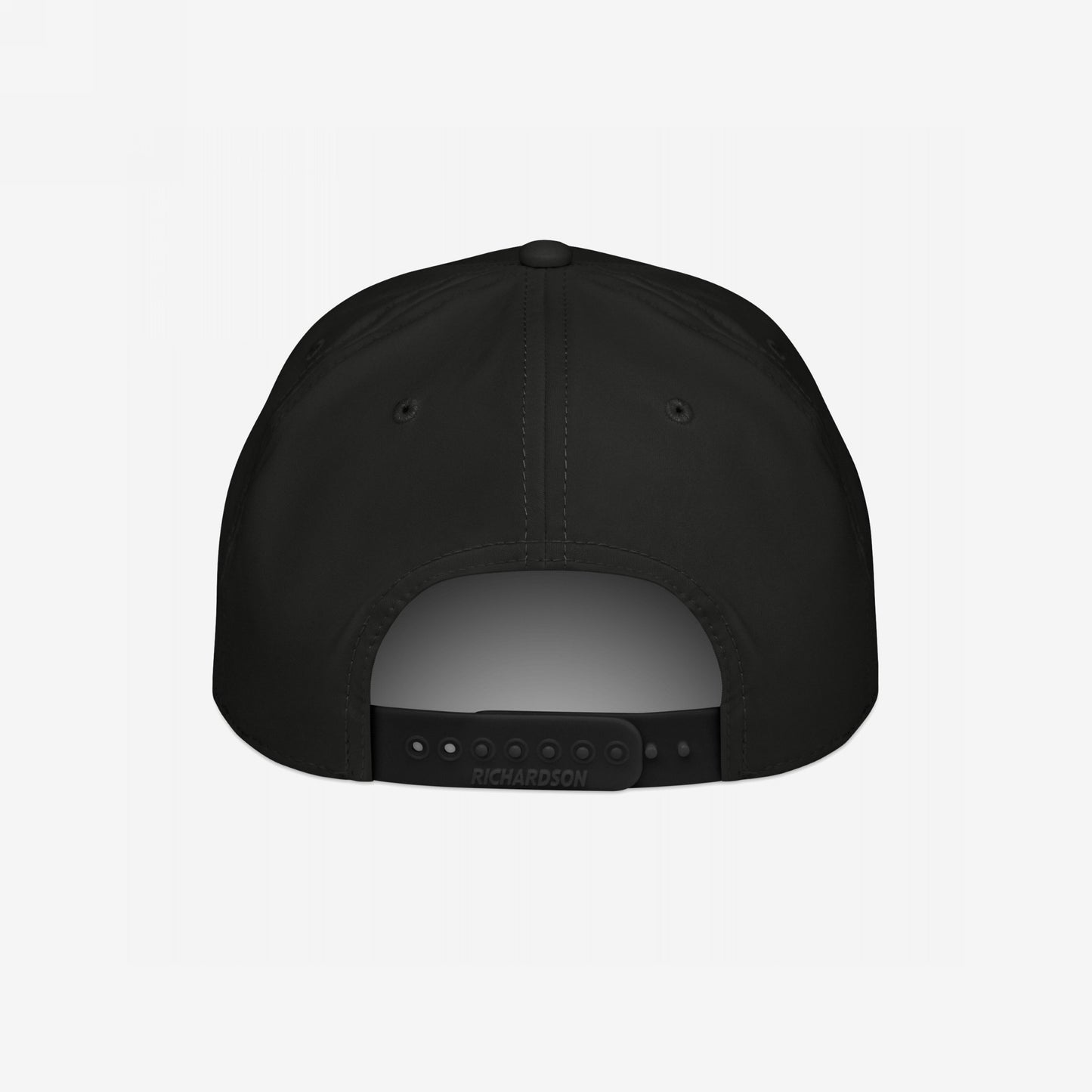 Back view of the Immigrant Hat, a black six-panel snapback with RICHARDSON on the adjustable strap. Features small ventilation eyelets and embodies rebellion with its bold stenciled barbed wire design.