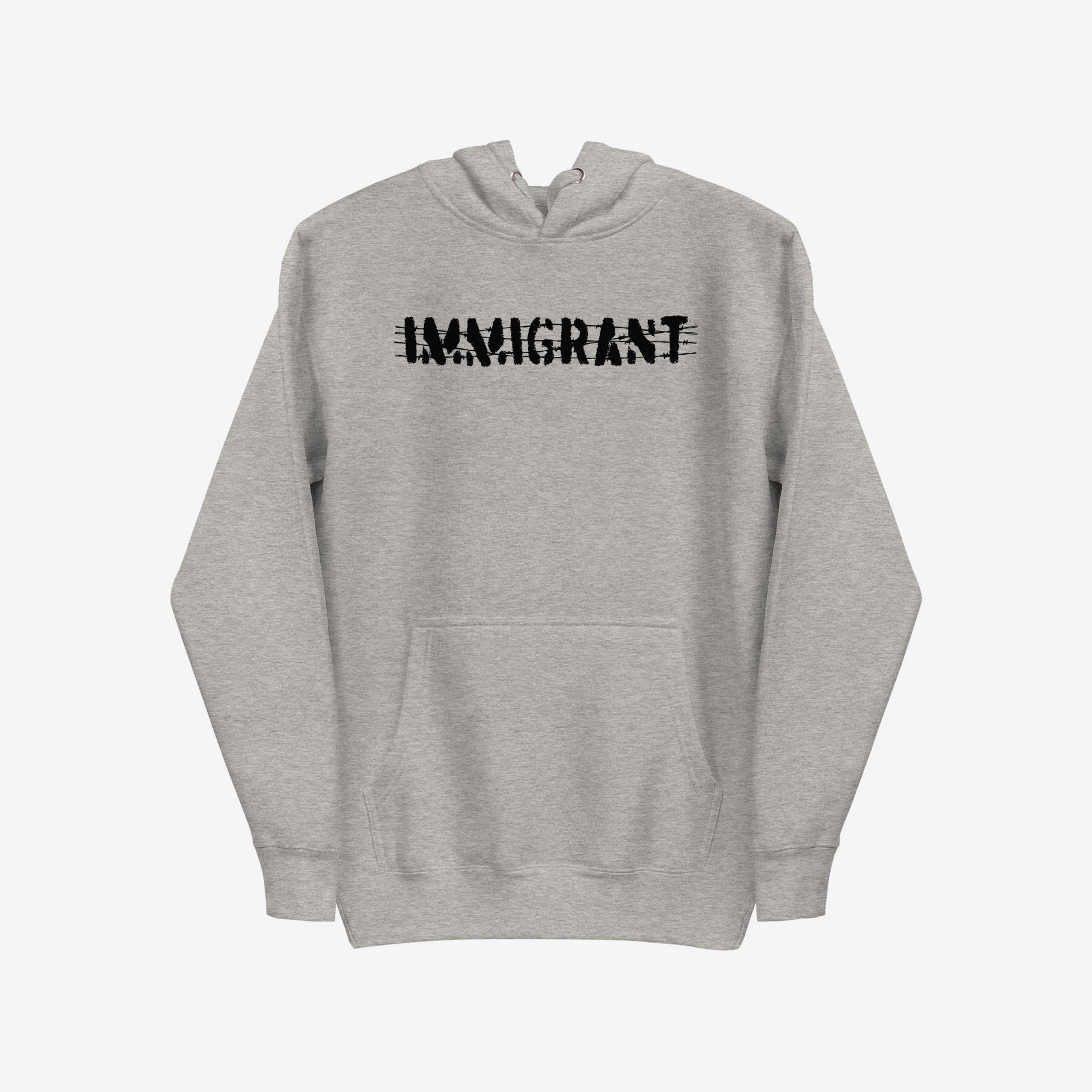 Immigrant Hoodie features a light-gray design with a front kangaroo pocket, adorned with IMMIGRANT in distressed, stenciled black font, symbolizing resistance and solidarity with immigrant communities.