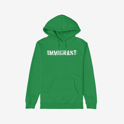 Green pullover hoodie featuring IMMIGRANT in bold white, crossed with barbed-wire-style lines, symbolizing resilience and solidarity. Part of the Immigrant Shirt collection, promoting strength and unity in the fight for equality.
