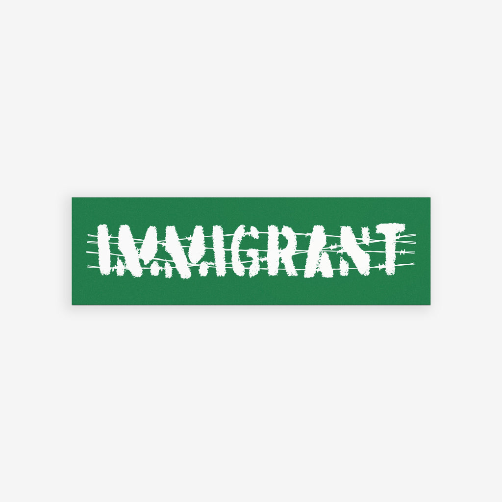 Aerial view of a street scene with a green banner reading IMMIGRANT in white, jagged letters over barbed-wire graphics. Immigrant Sticker & Magnet symbolizes unity and resilience against anti-immigrant sentiment.