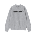 Light-grey Immigrant Hoodie & Sweatshirt features bold, distressed IMMIGRANT lettering with slash-through style, embodying ac