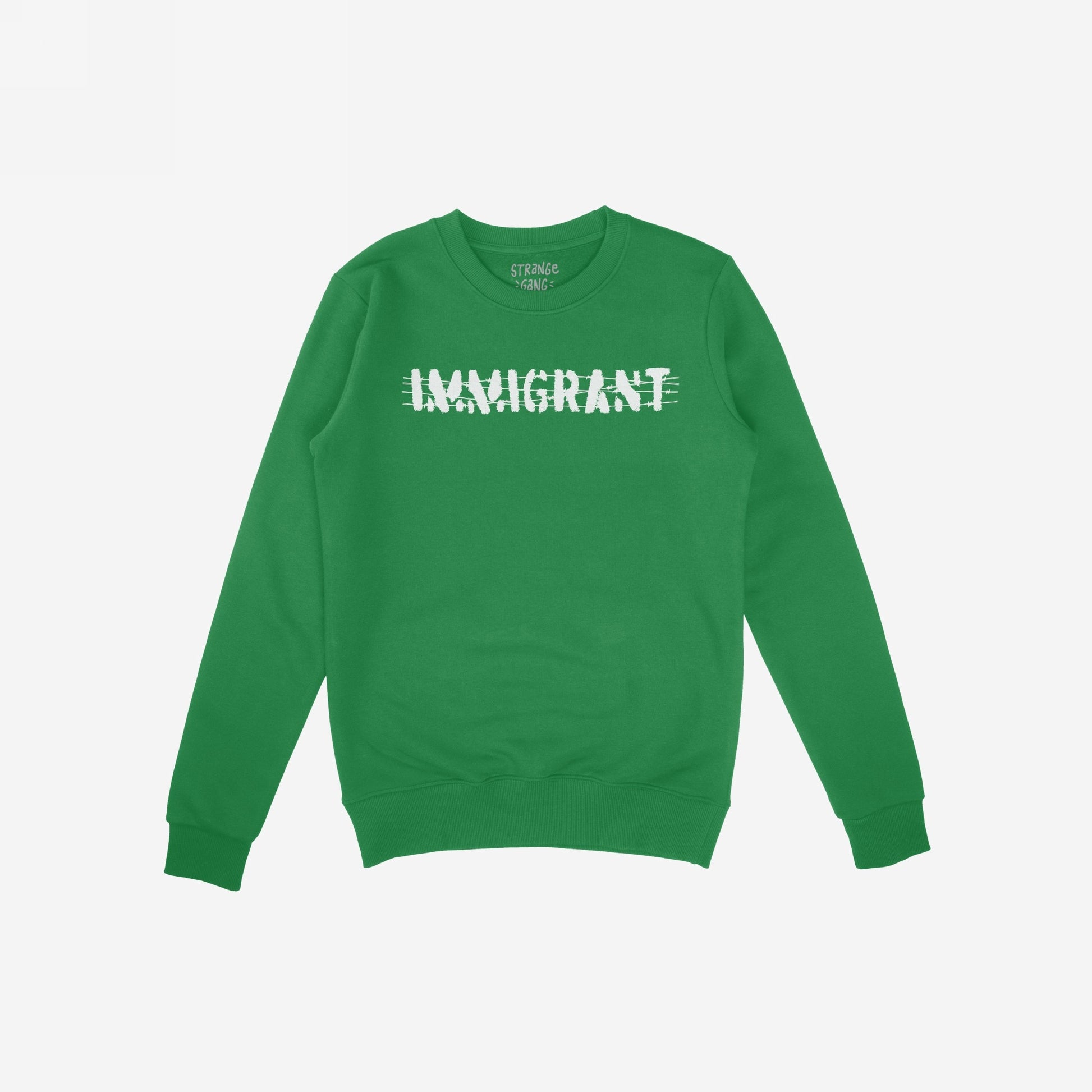The Immigrant Shirt features bold white stencil lettering crossed out with barbed-wire lines, symbolizing resilience and unity. Ideal for activists and allies supporting justice and equality.