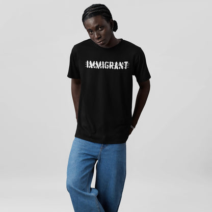 Young Black man models the Immigrant Shirt featuring distressed IMMIGRANT lettering, expressing resilience and unity. Styled with cornrow braids and accessories, it embodies activism and solidarity.