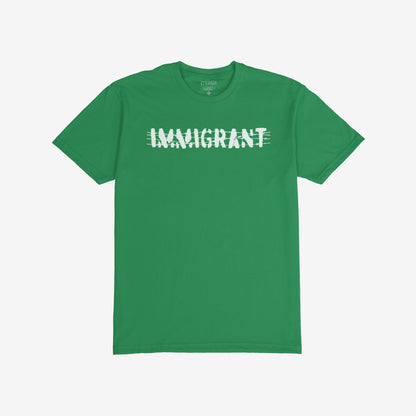 Green T-shirt featuring IMMIGRANT in bold, crossed-out white letters, symbolizing resistance and solidarity. Designed for activists and allies, it embodies the fight for justice and equality.