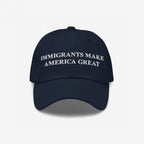 Immigrants Make America Great Hat showcasing bold white embroidery, symbolizes support for immigrant communities. Ideal for daily wear or protests, it aligns with values against hate and for equality.