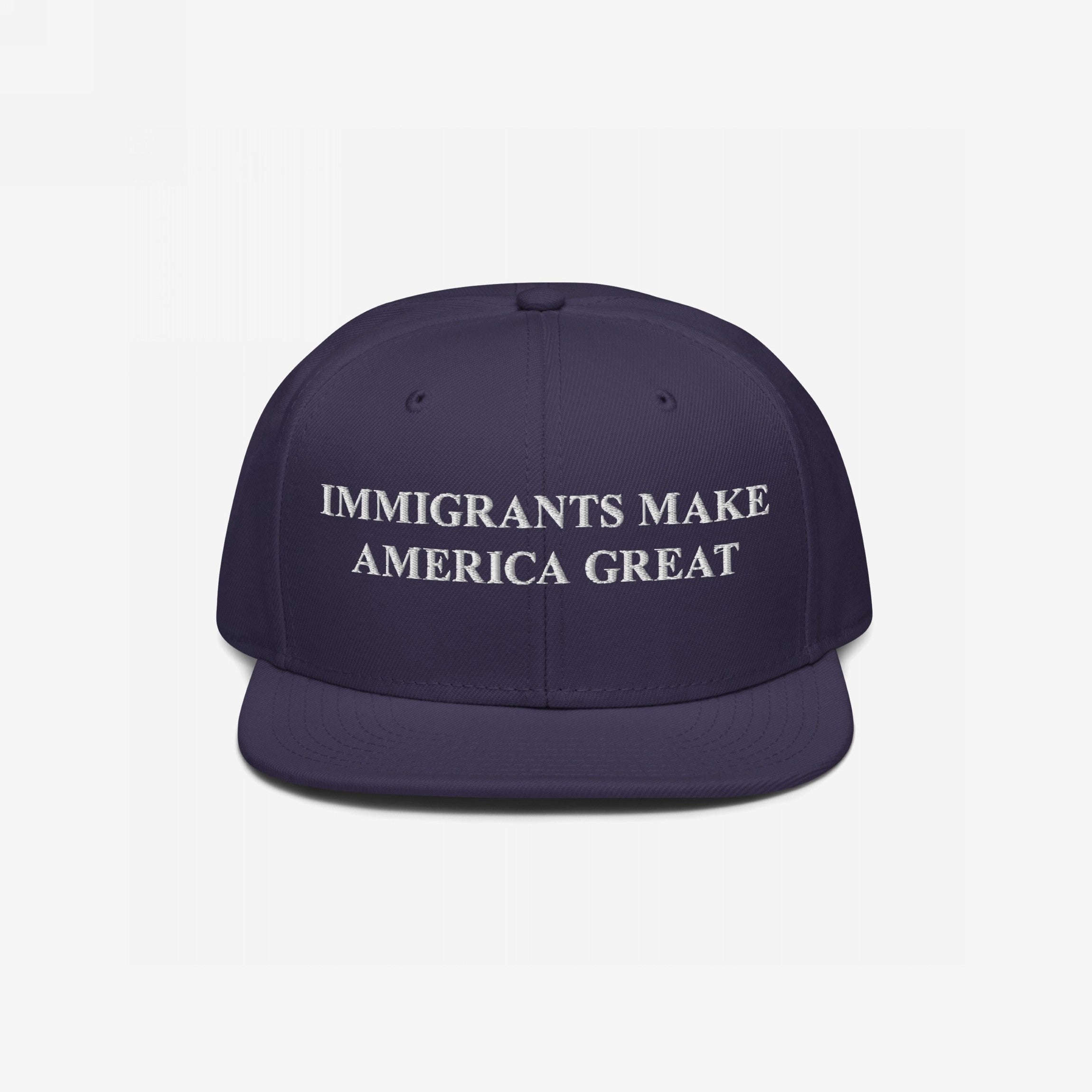 Immigrants Make America Great Hat with white embroidery boldly displays its message, designed for advocacy and solidarity. Ideal for daily wear or protests, supporting immigrant rights and community empowerment.