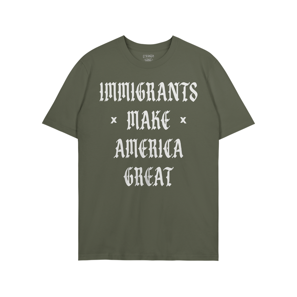 Plain green T-shirt with bold white slogan IMMIGRANTS × MAKE × AMERICA GREAT in Old English style, symbolizing protest and 