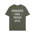 Plain green T-shirt with bold white slogan IMMIGRANTS × MAKE × AMERICA GREAT in Old English style, symbolizing protest and 