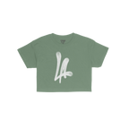 LA Handstyle Women's Baby Tee in bright kelly-green, featuring a prominent graffiti-inspired LA logo in soft white. The label