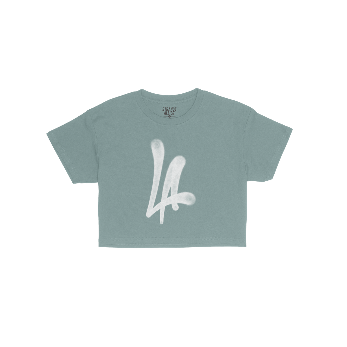 LA Handstyle Women's Baby Tee in medium blue features a bold white LA spray-paint graphic on the chest, capturing a retro Y2K