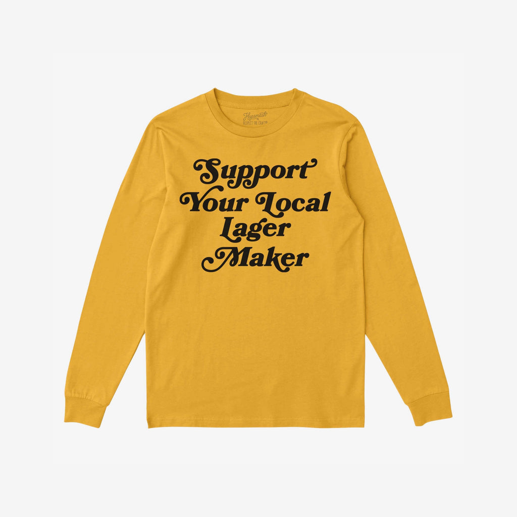 Mustard yellow long-sleeve T-shirt with bold, black retro lettering reading “Support Your Local Lager Maker,” embodying small-batch loyalty and community spirit in a bold, vintage-inspired design.