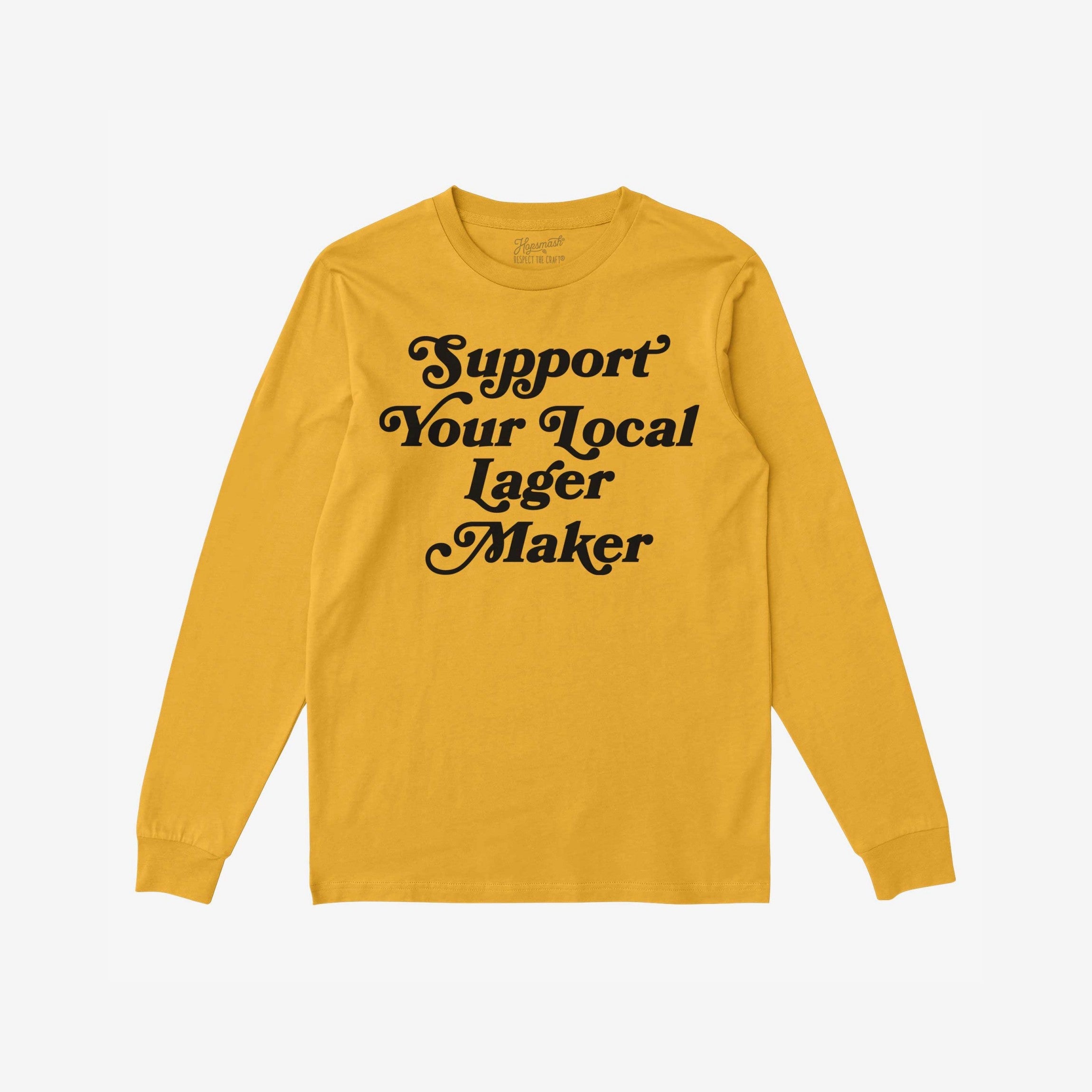 Mustard yellow long-sleeve T-shirt with bold, black retro lettering reading “Support Your Local Lager Maker,” embodying small-batch loyalty and community spirit in a bold, vintage-inspired design.