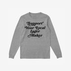 Heather-gray long-sleeve T-shirt featuring bold black lettering stating “Support Your Local Lager Maker,” embodying a grassroots vibe and community spirit. Ideal for beer enthusiasts valuing local craftsmanship.