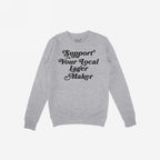 Support Your Local Lager Maker Hoodie & Sweatshirt features a vintage-style script promoting local brewers, embodying a spirited nod to craft beer culture. Laid flat, showcasing its cozy, unisex design.