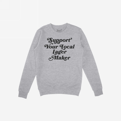 Support Your Local Lager Maker Hoodie & Sweatshirt features a vintage-style script promoting local brewers, embodying a spirited nod to craft beer culture. Laid flat, showcasing its cozy, unisex design.