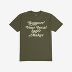 Support Your Local Lager Maker T-shirt featuring retro cream script, embodying neighborhood brewery pride and small-batch spirit. Ideal for beer lovers who value local craftsmanship and community over corporate brands.