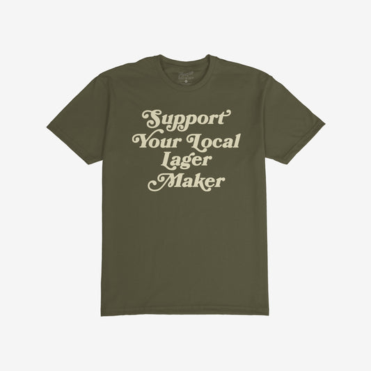 Support Your Local Lager Maker T-shirt featuring retro cream script, embodying neighborhood brewery pride and small-batch spirit. Ideal for beer lovers who value local craftsmanship and community over corporate brands.