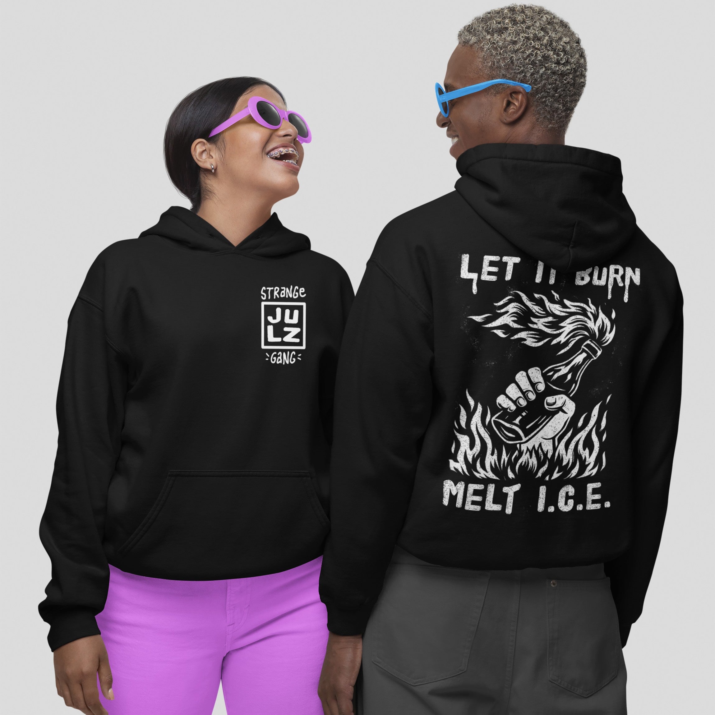 Two models wear the Let It Burn / Melt ICE Hoodie & Sweatshirt, featuring a Molotov graphic and slogan on the back, small front logo, with bright sunglasses and casual pants.